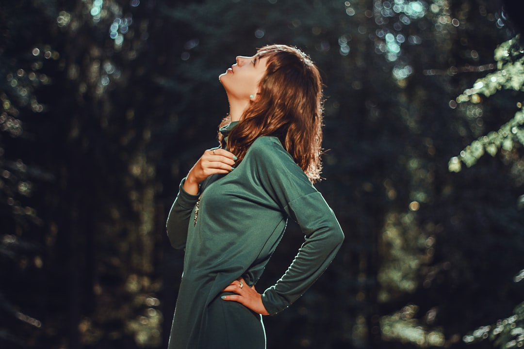 selective focus photo of woman looking up enjoying movement as part of a lifestyle medicine menopause support programme